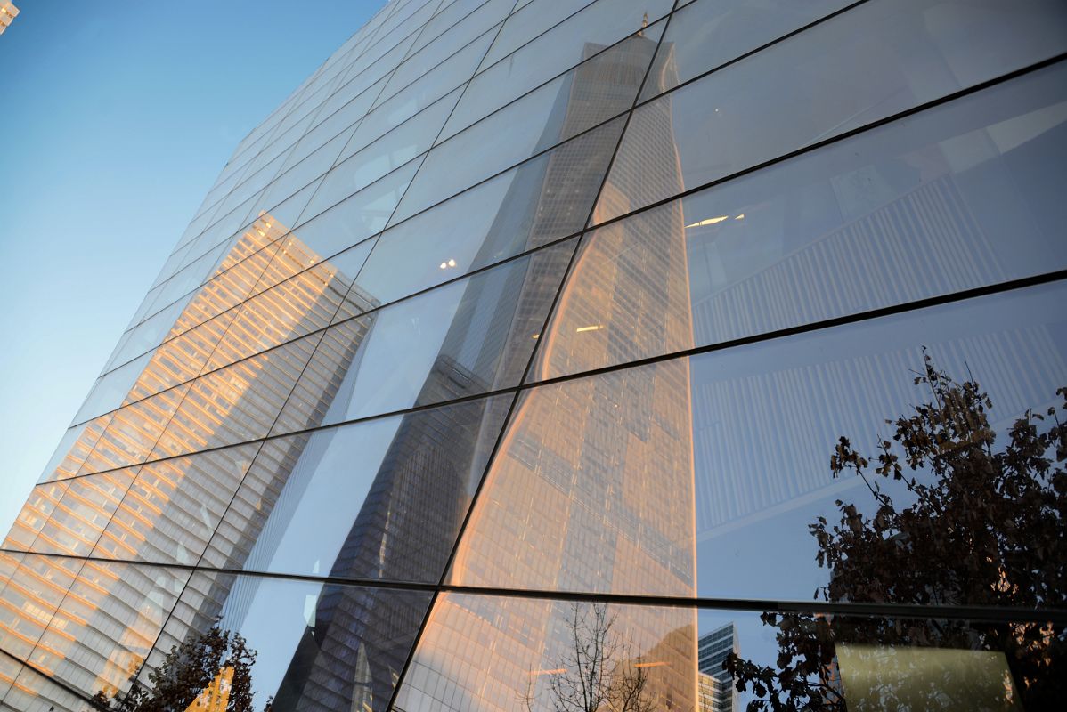 03 One World Trade Center, 7 World Trade Center Reflected In 911 Museum Entry Pavilion Late Afternoon